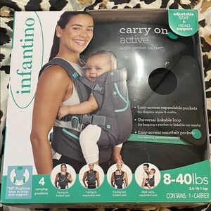 Infantino Black and Teal Multi-Pocket Carrier
